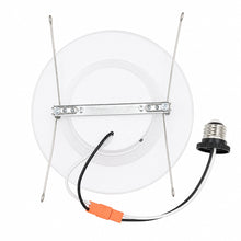 Back view of a 13 watt can light showing circular recessed housing design