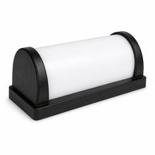 Side view of an aluminum cylinder dusk to dawn wall sconce showing modern cylindrical fixture design