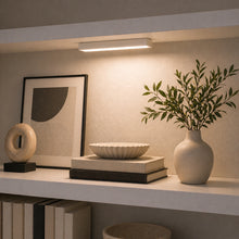 Installed under cabinet LED light providing bright task lighting for living area